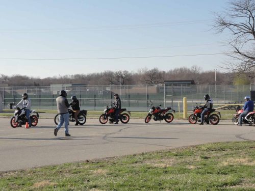 Six motorcyclists in training with instructor